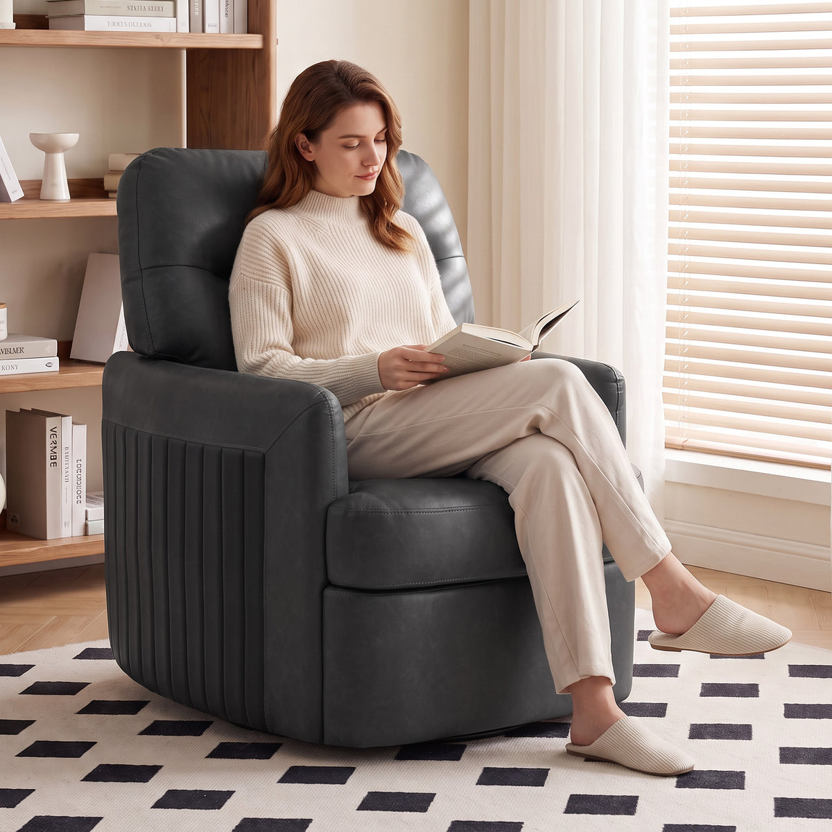 Dark grey PU leather swivel accent chair with padded arms and rounded seat base