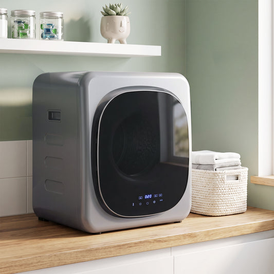 Compact vented tumble dryer with silver body and dark door window