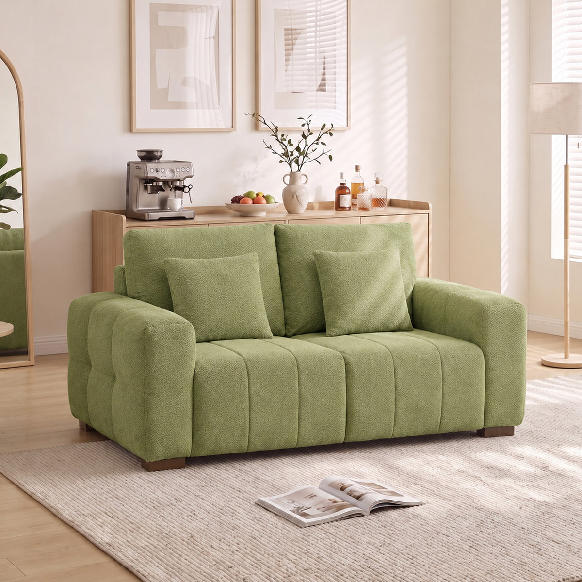 Green velvet 2-seater sofa with button-tufted back, cushioned seat, and wood legs.