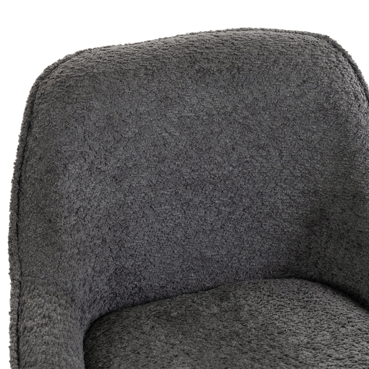 Dark grey upholstered bar stool seat, textured fabric close-up
