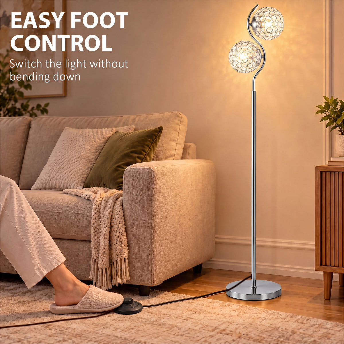 Silver dual-head floor lamp with two crystal globe shades and a round base with foot switch.