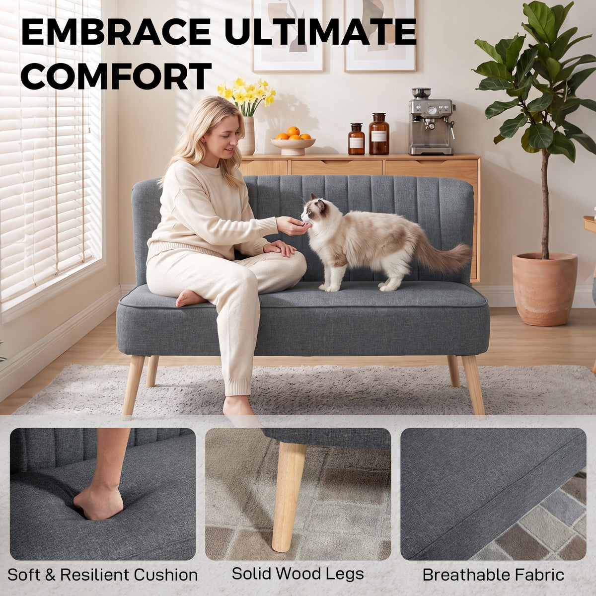 Dark grey loveseat sofa with tufted back, cushioned seat, and light wood legs