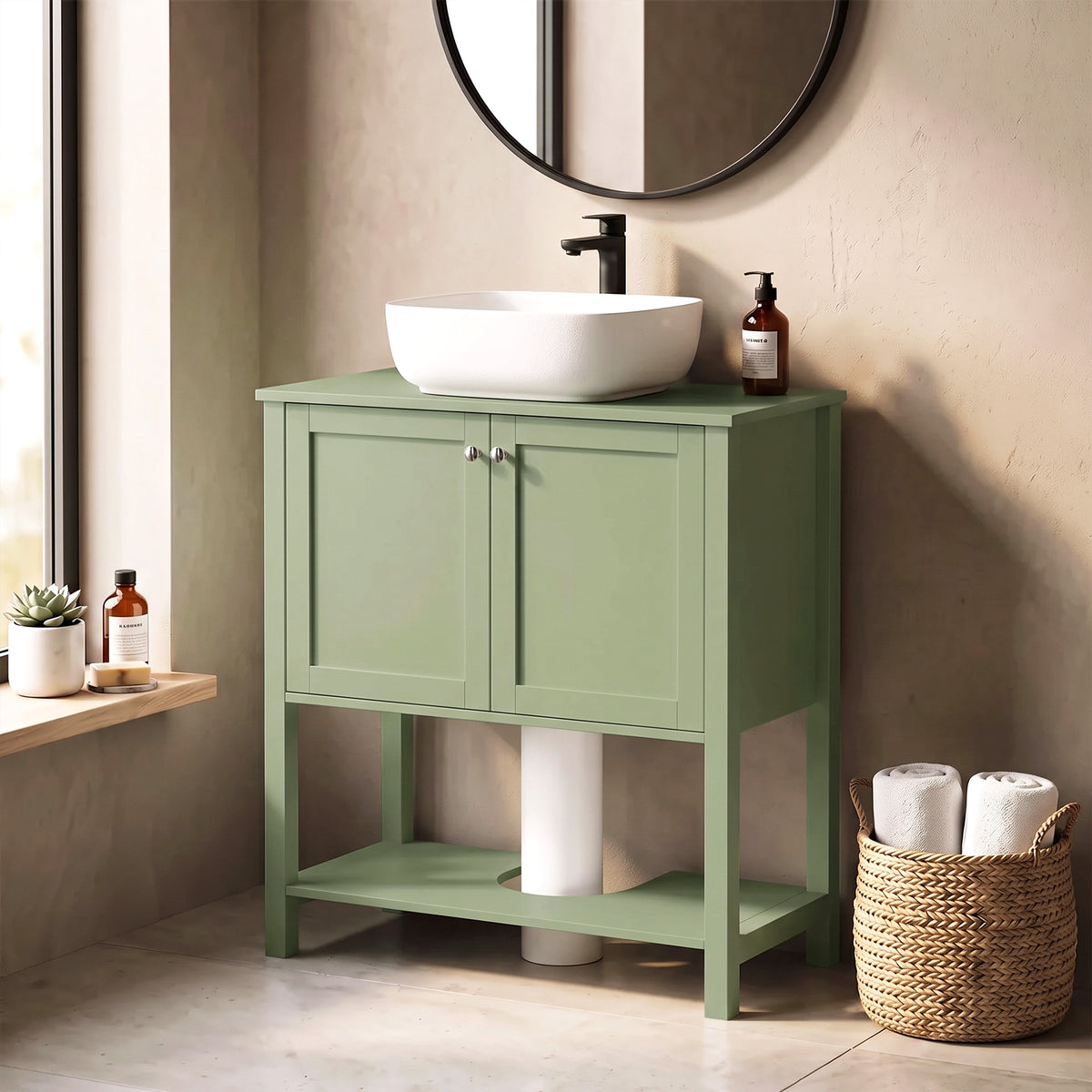 Green bathroom vanity cabinet with two doors, open shelf below, and rounded faucet area.