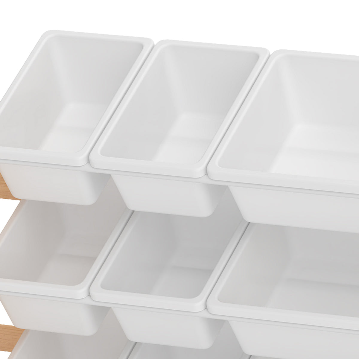 White plastic storage bins on a 3-shelf toy organizer, close-up of bin compartments
