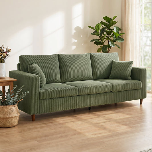 Green corduroy 3-seat sofa with wide seat cushions and rounded track arms