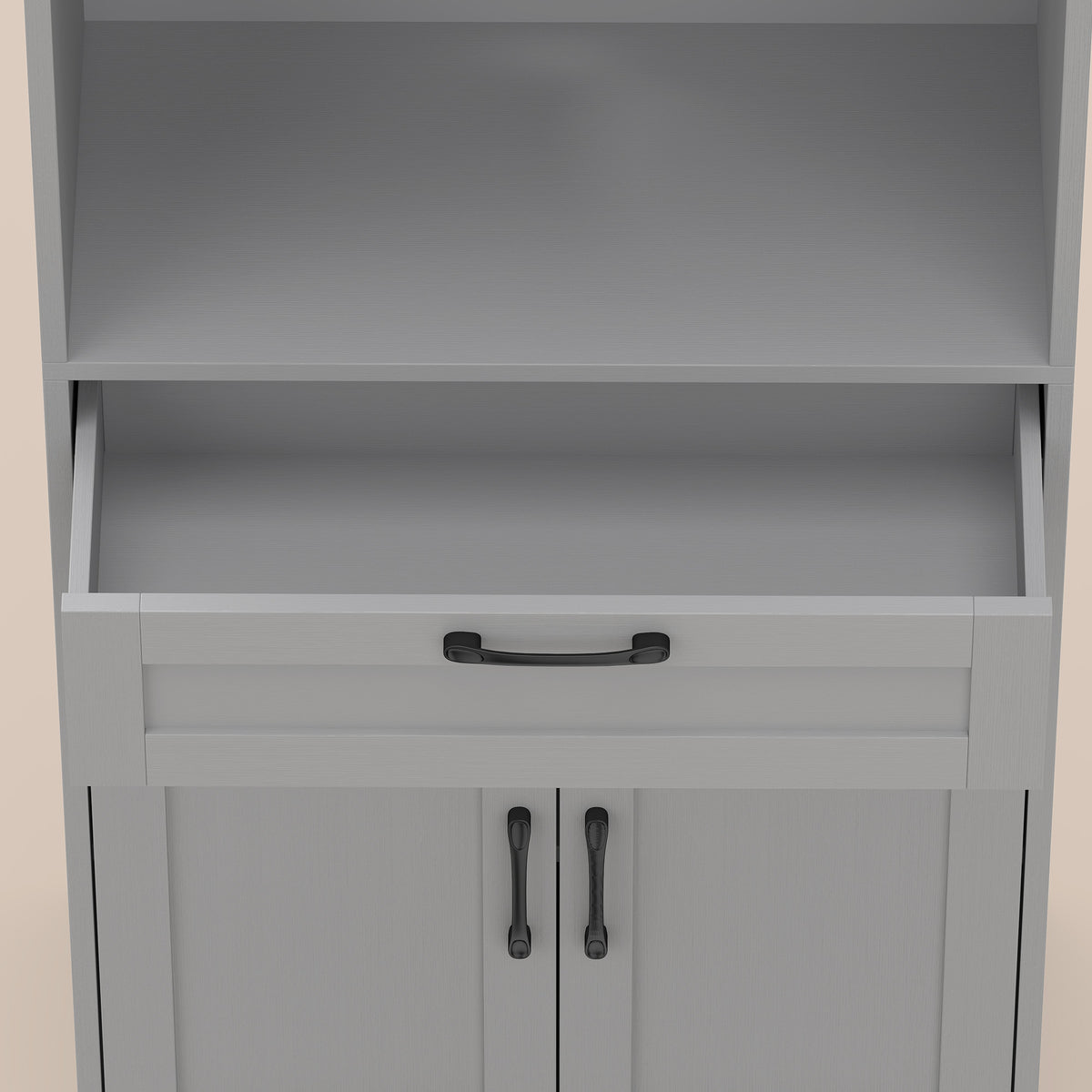 Kitchen pantry drawer front with pull handle and cabinet doors below open shelf