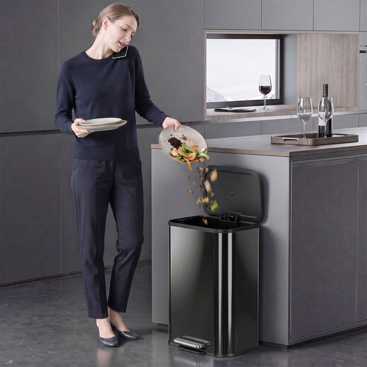 Black metal kitchen pedal bin with soft-close lid and removable inner bucket