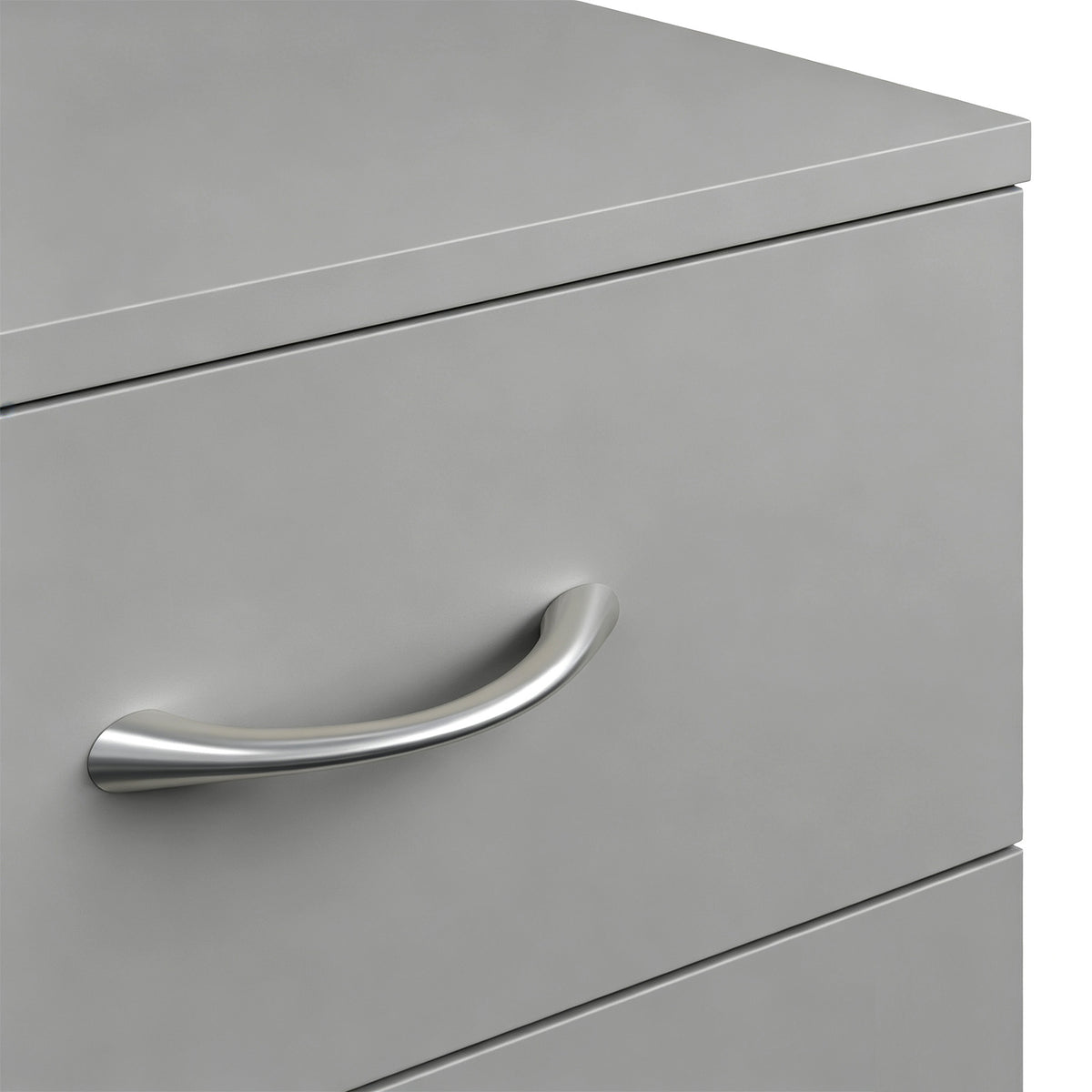 Grey drawer front with curved chrome-style metal handle on a smooth panel.