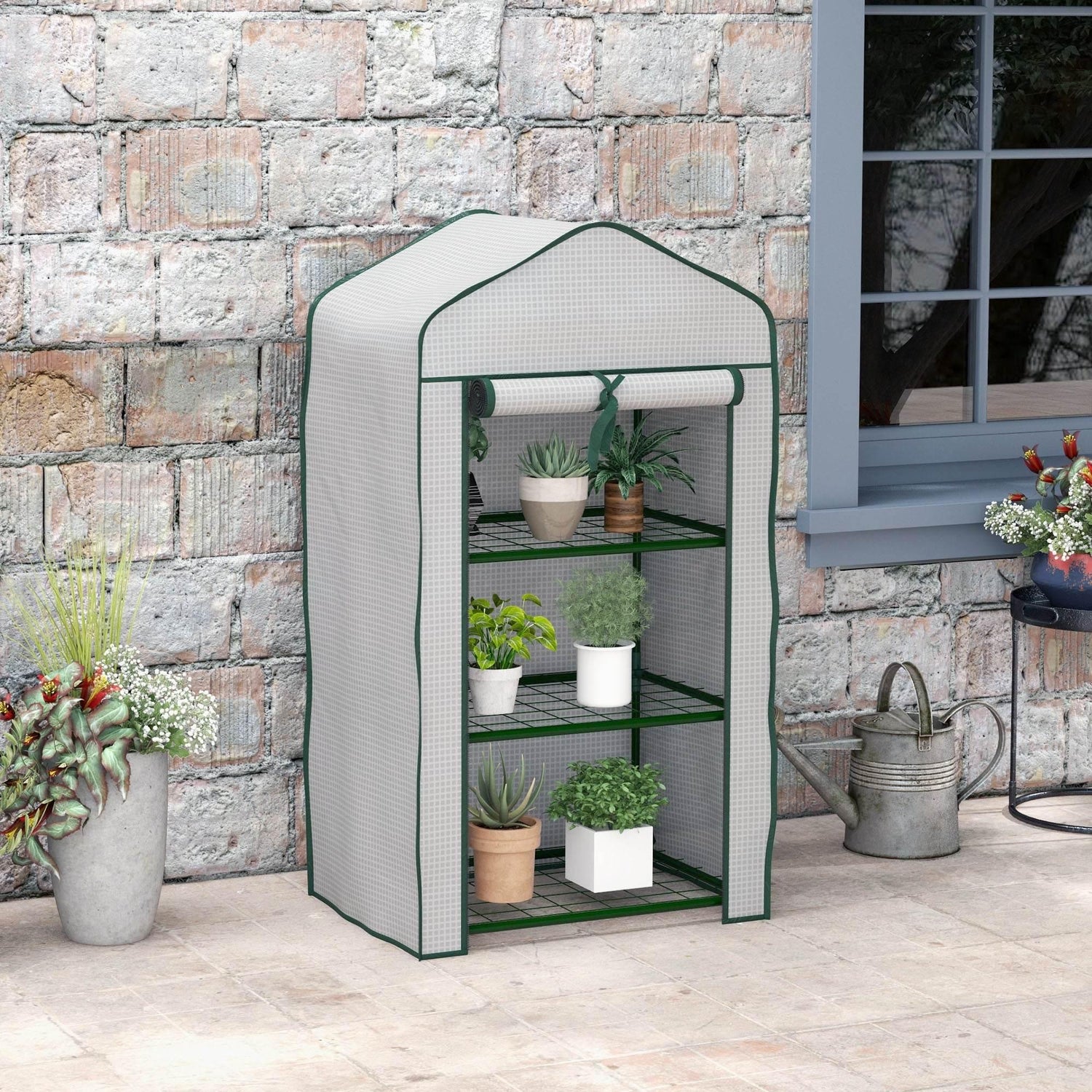 Three-tier portable mini greenhouse with white PE cover and green-trim wire shelves