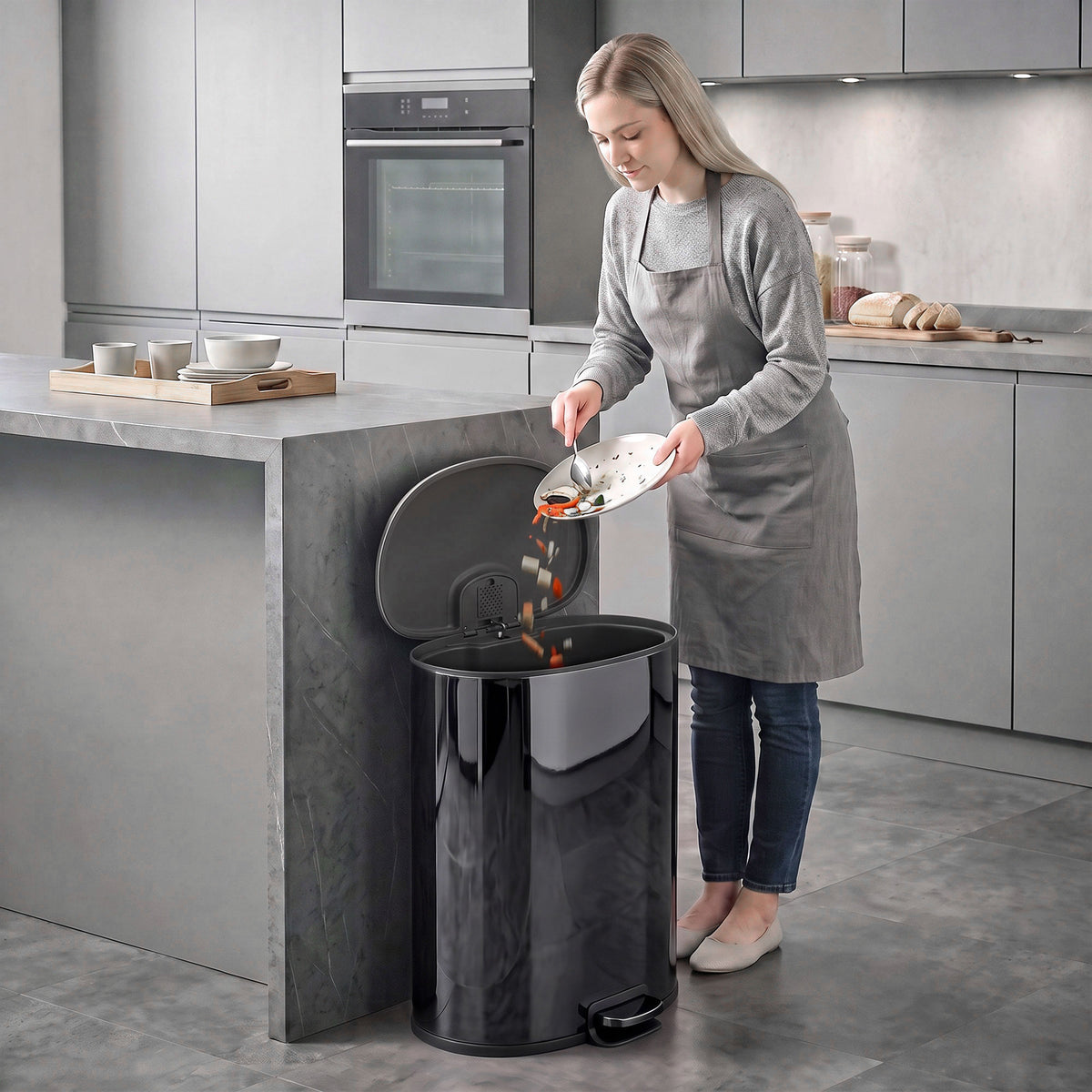 Black stainless-steel kitchen pedal bin with soft-close lid and removable inner bucket