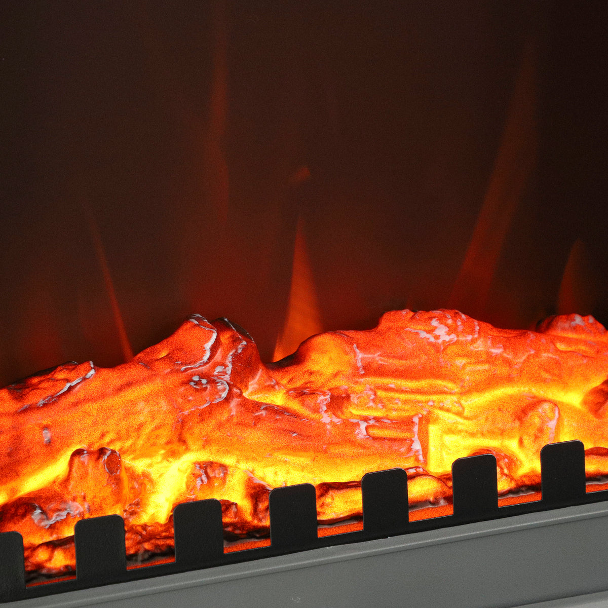 Grey electric fireplace stove with LED flame effect glowing behind glass