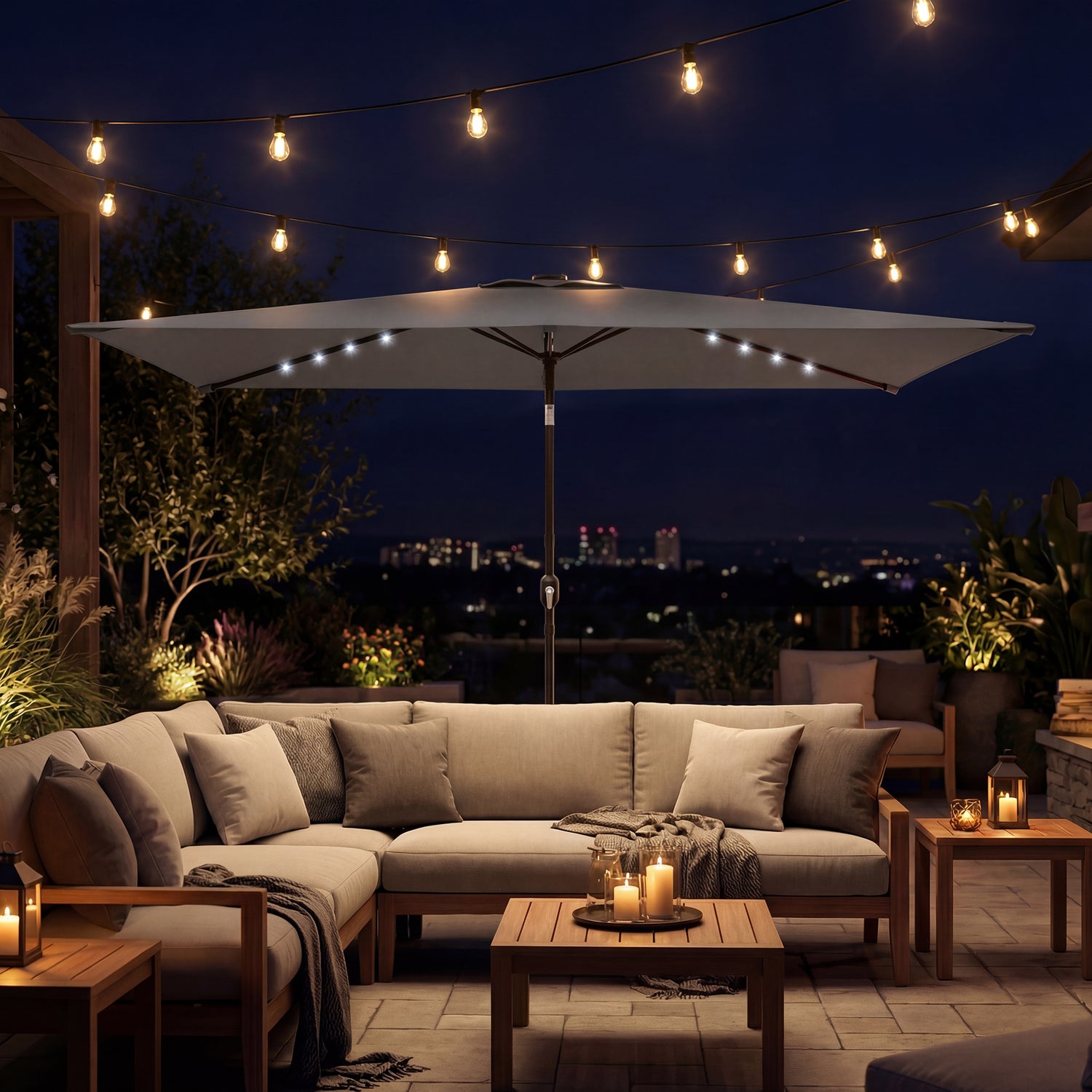 Dark grey garden parasol with LED string lights over outdoor seating area