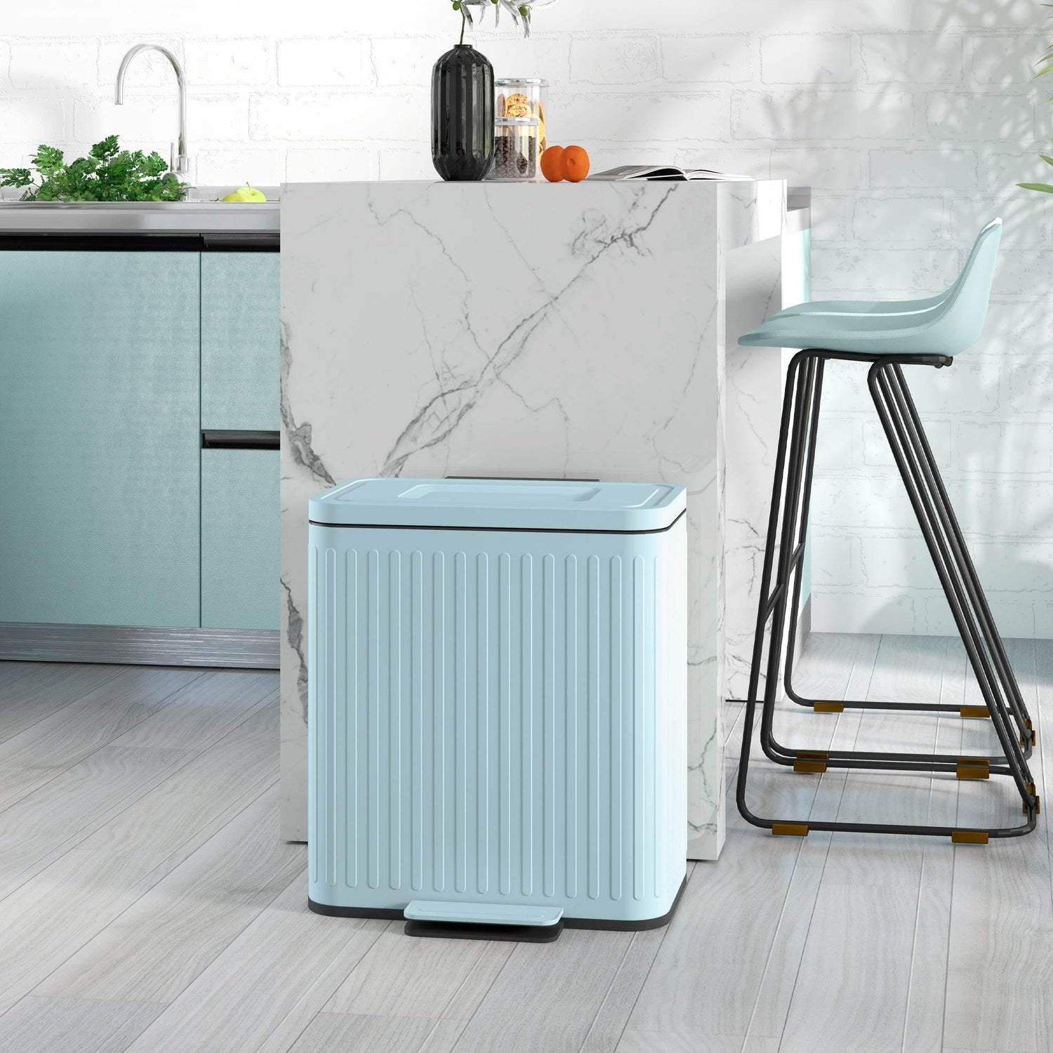 Light green dual-compartment kitchen bin with soft-close lid and pedal opening