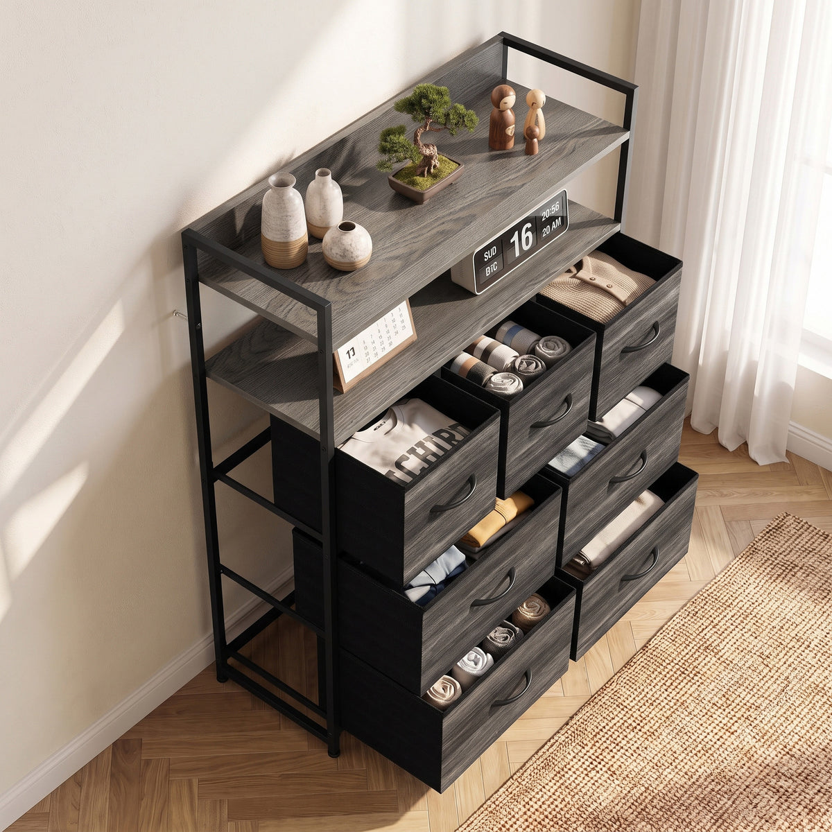 Grey wood-effect fabric dresser with open shelves and seven drawers, black frame