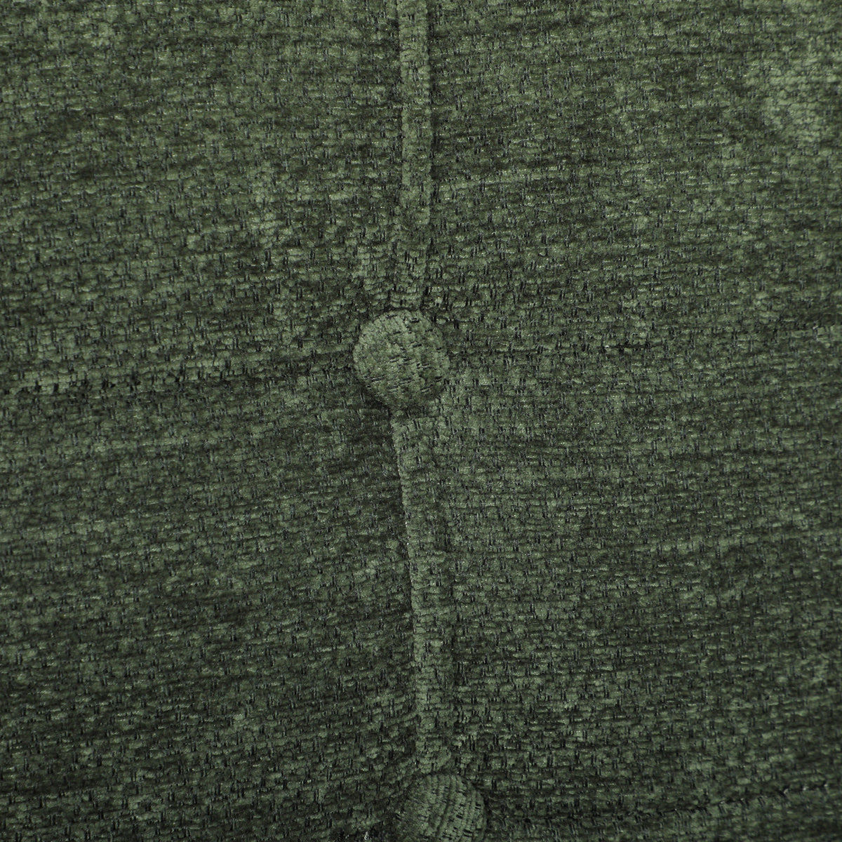 Close-up of dark green chenille fabric upholstery with woven texture and tufted seams