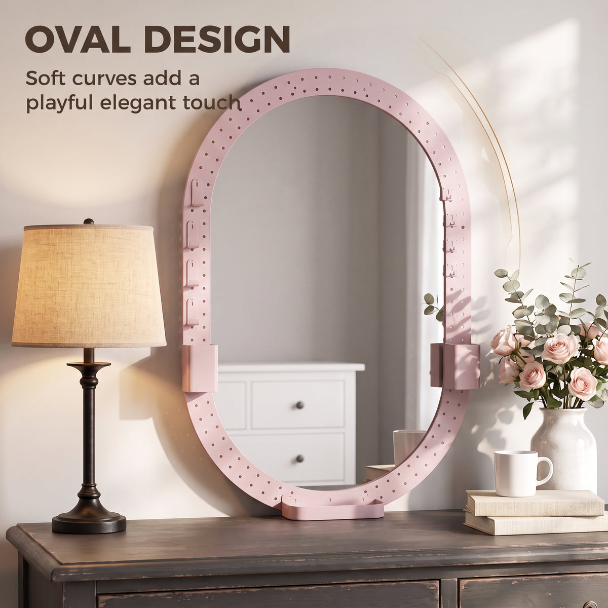 Oval pink pegboard wall mirror with frame hooks and side hanging storage pockets
