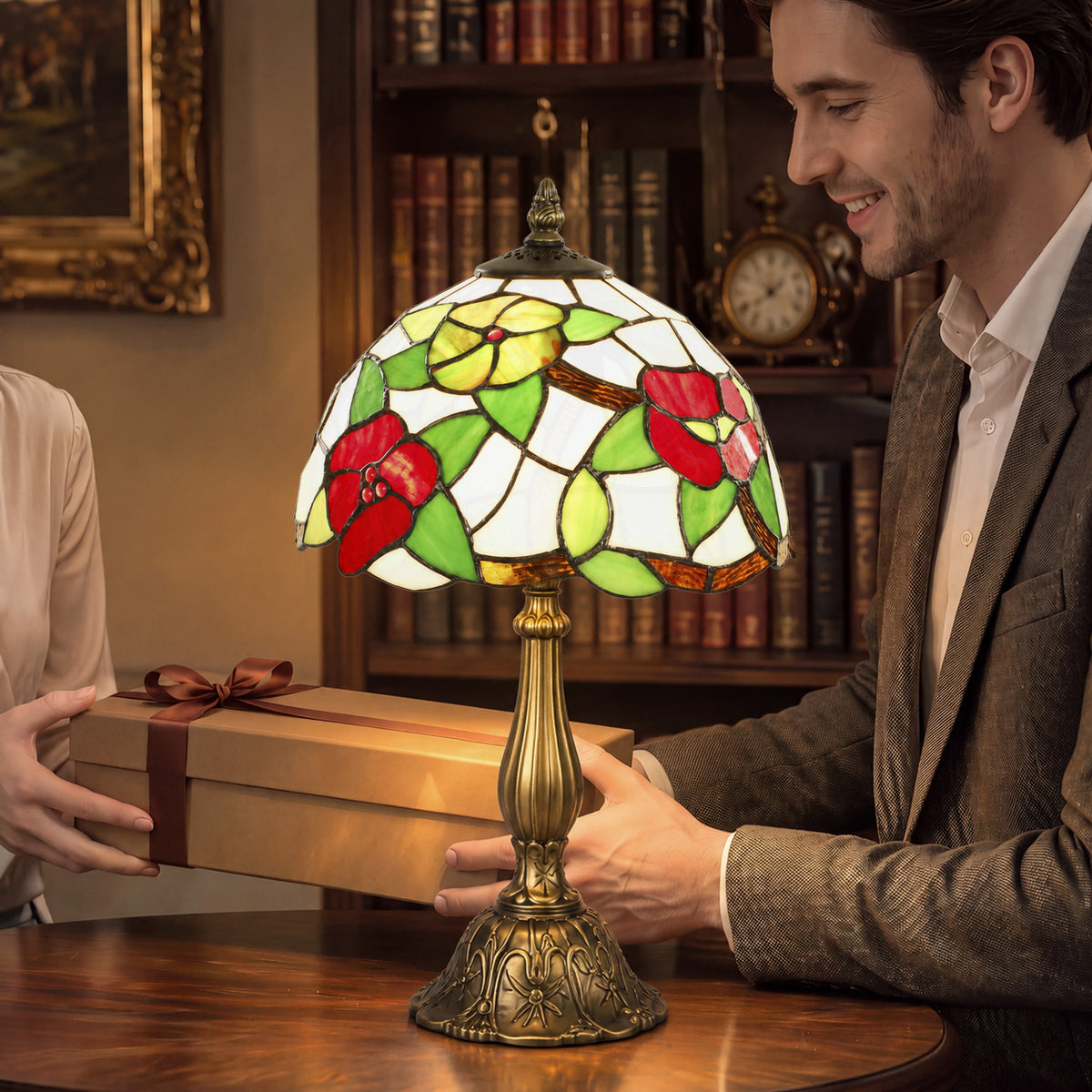 Stained glass table lamp with floral shade and brass base for bedside or living room