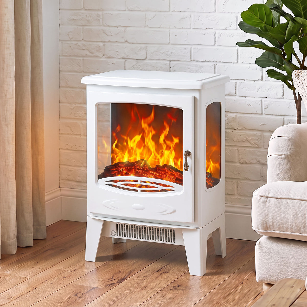 White freestanding electric fireplace heater with flames in a glass-front door