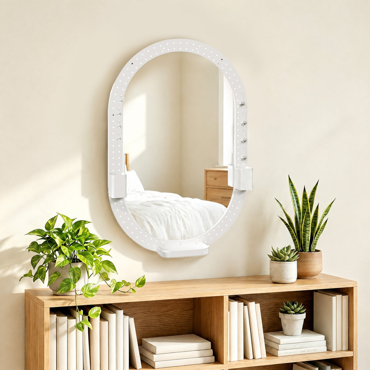 White oval wall mirror with perforated pegboard frame and side storage shelves