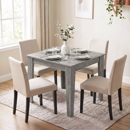 Grey square dining table with wood-effect finish and four supporting legs