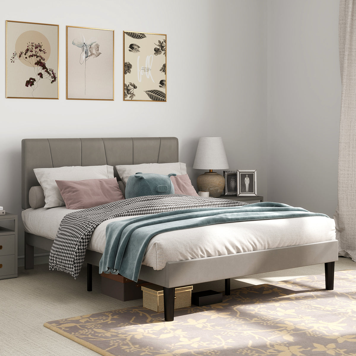 Grey upholstered double bed frame with tall paneled headboard and slat-supported base