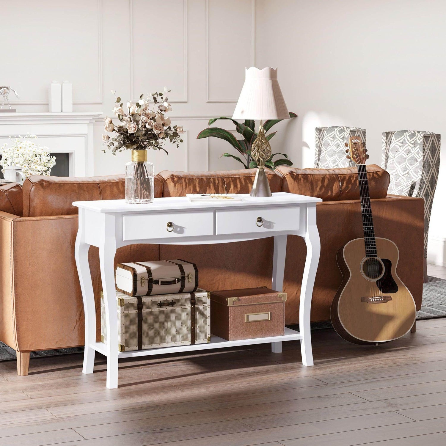 White console table with two drawers, open shelf, and curved legs