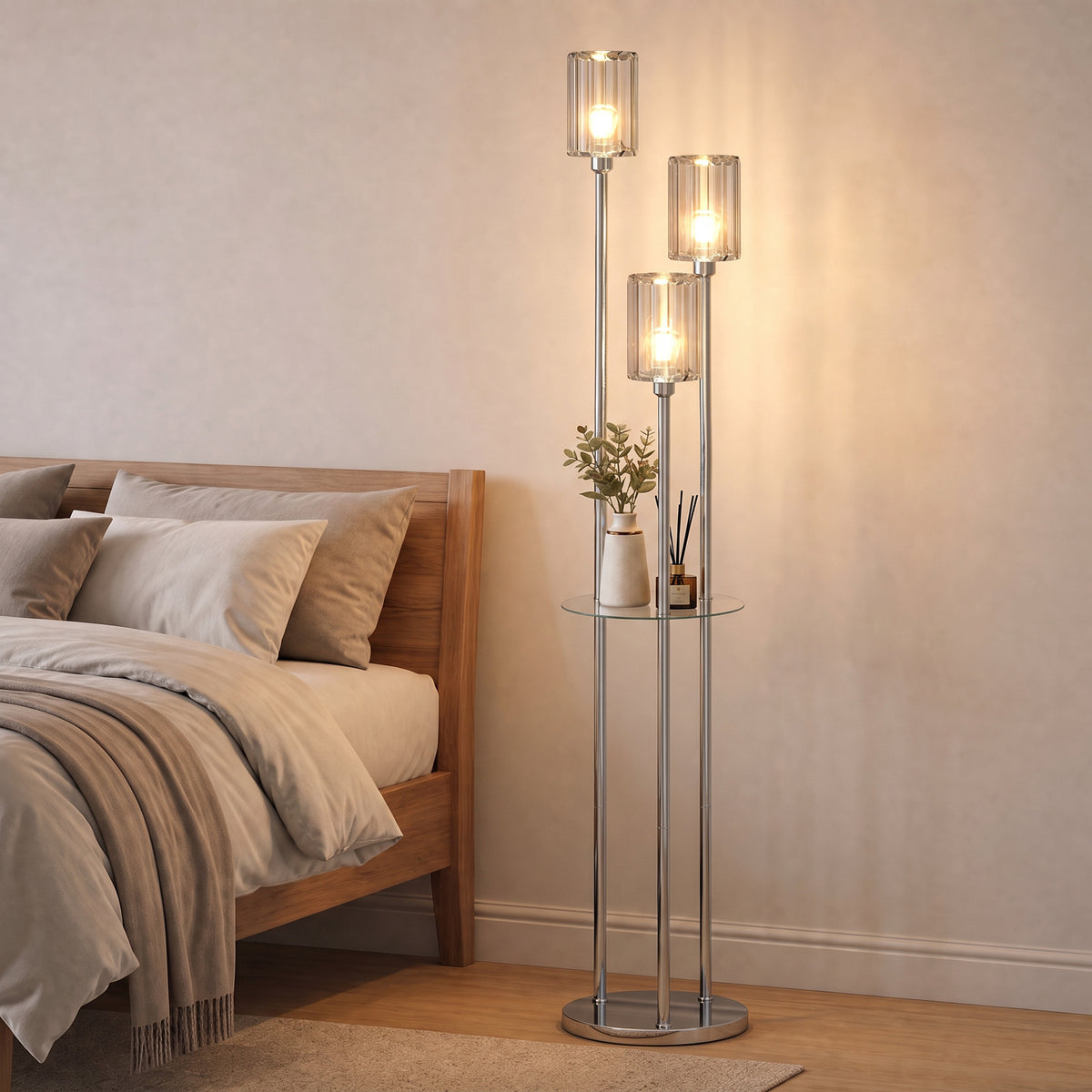 Chrome crystal floor lamp with three glowing glass shades and dual-tier glass shelves