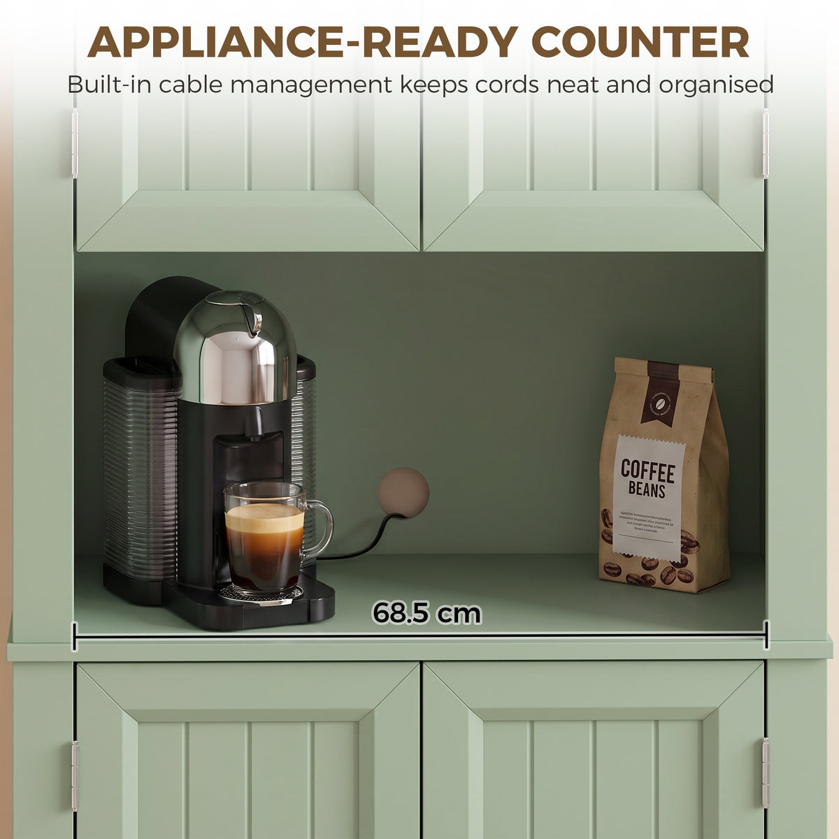 Sage green appliance-ready kitchen cabinet with open counter space for small appliances