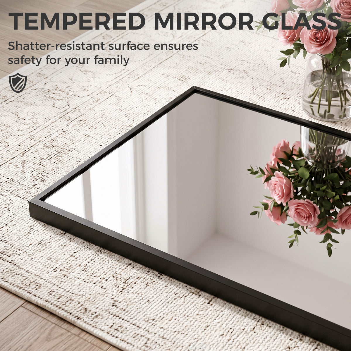 Tempered glass full-length mirror with black frame on textured surface