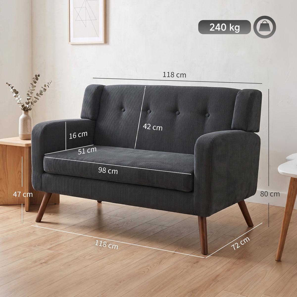 Gray compact loveseat with tufted back, rounded arms, and wooden legs
