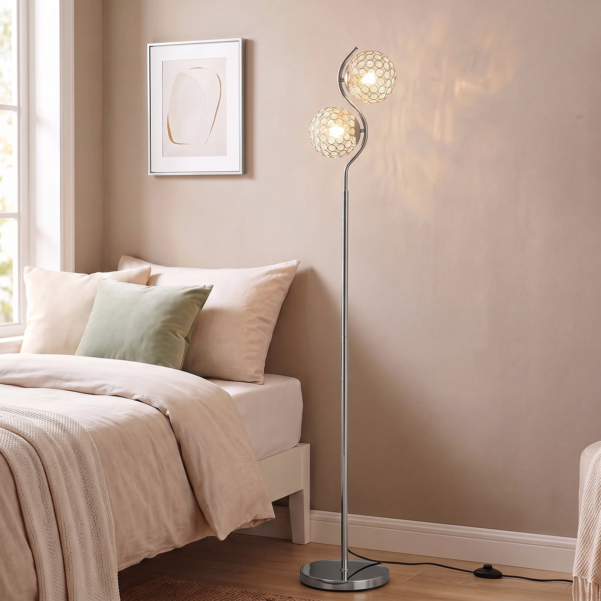 Silver floor lamp with two stacked crystal globe shades on a round base.