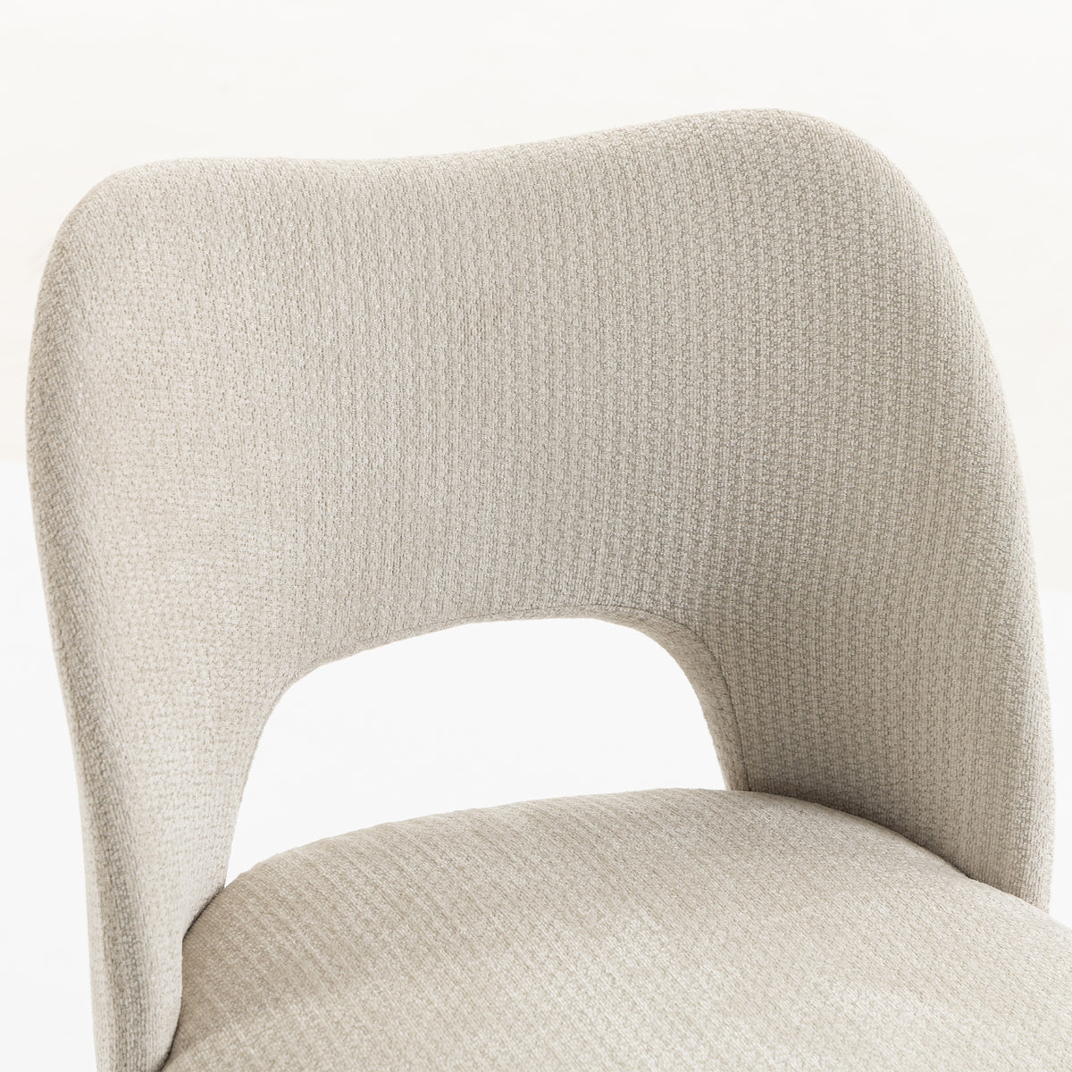 Beige chenille dining chair with curved back and cushioned seat, front view.