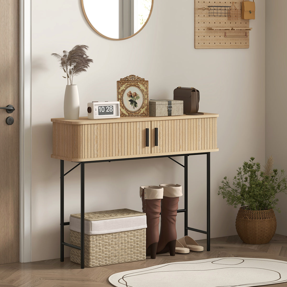 Light wood entry console table with two sliding slatted doors and black metal legs