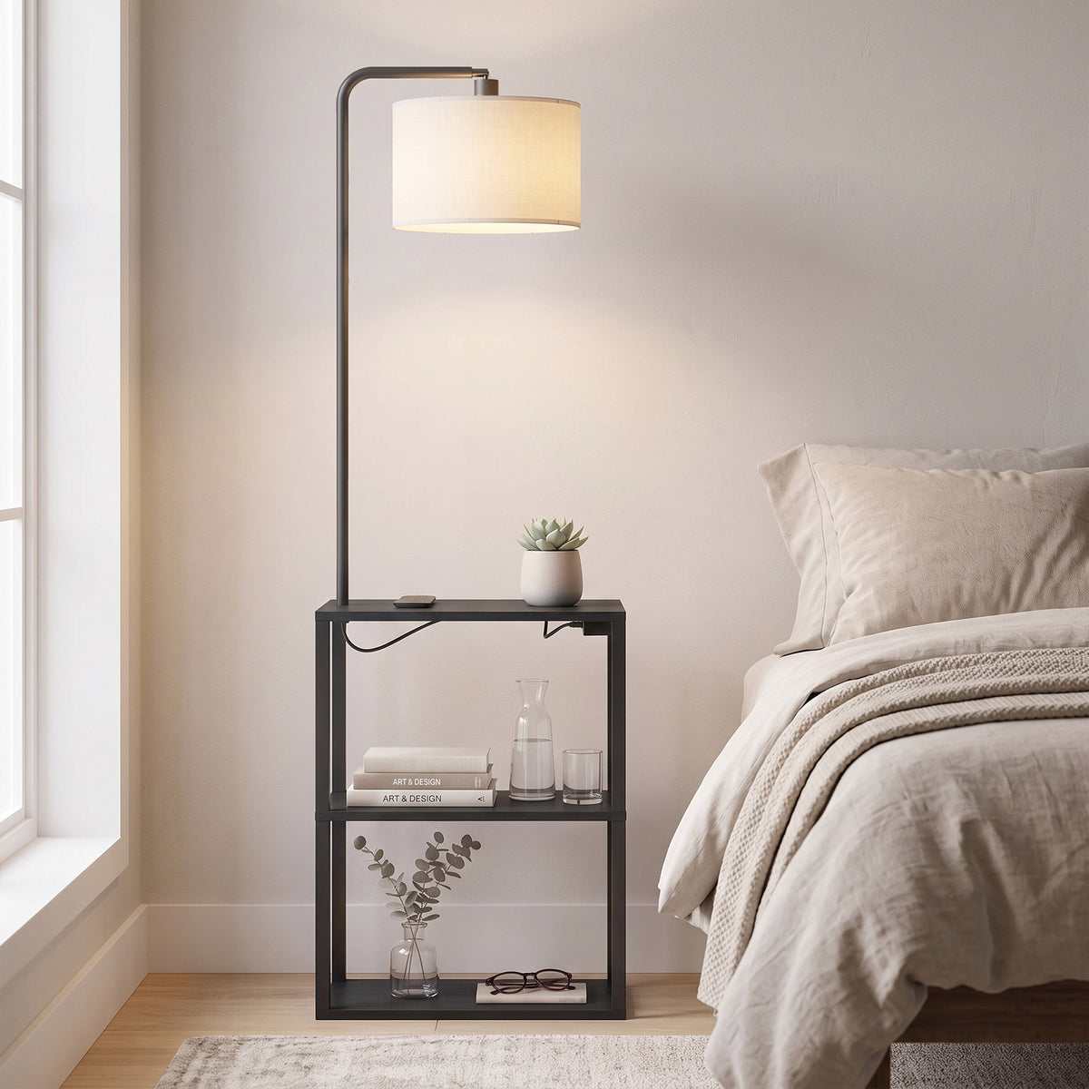 Black floor lamp with off-white shade and small 3-tier shelving