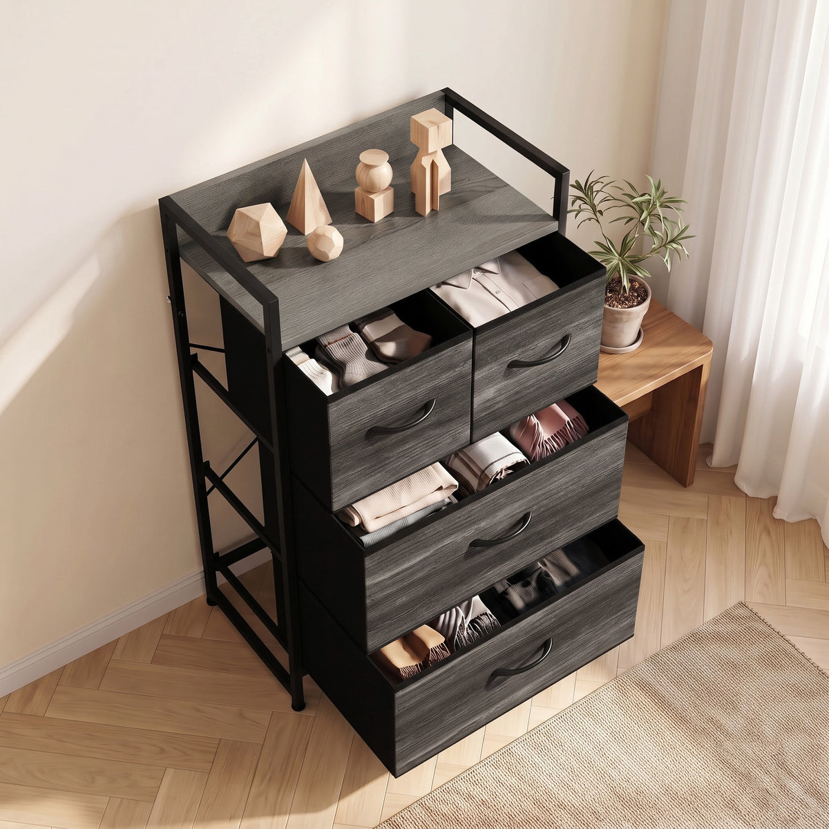 Grey wood-effect dresser with four fabric drawers, black steel frame and open top shelf