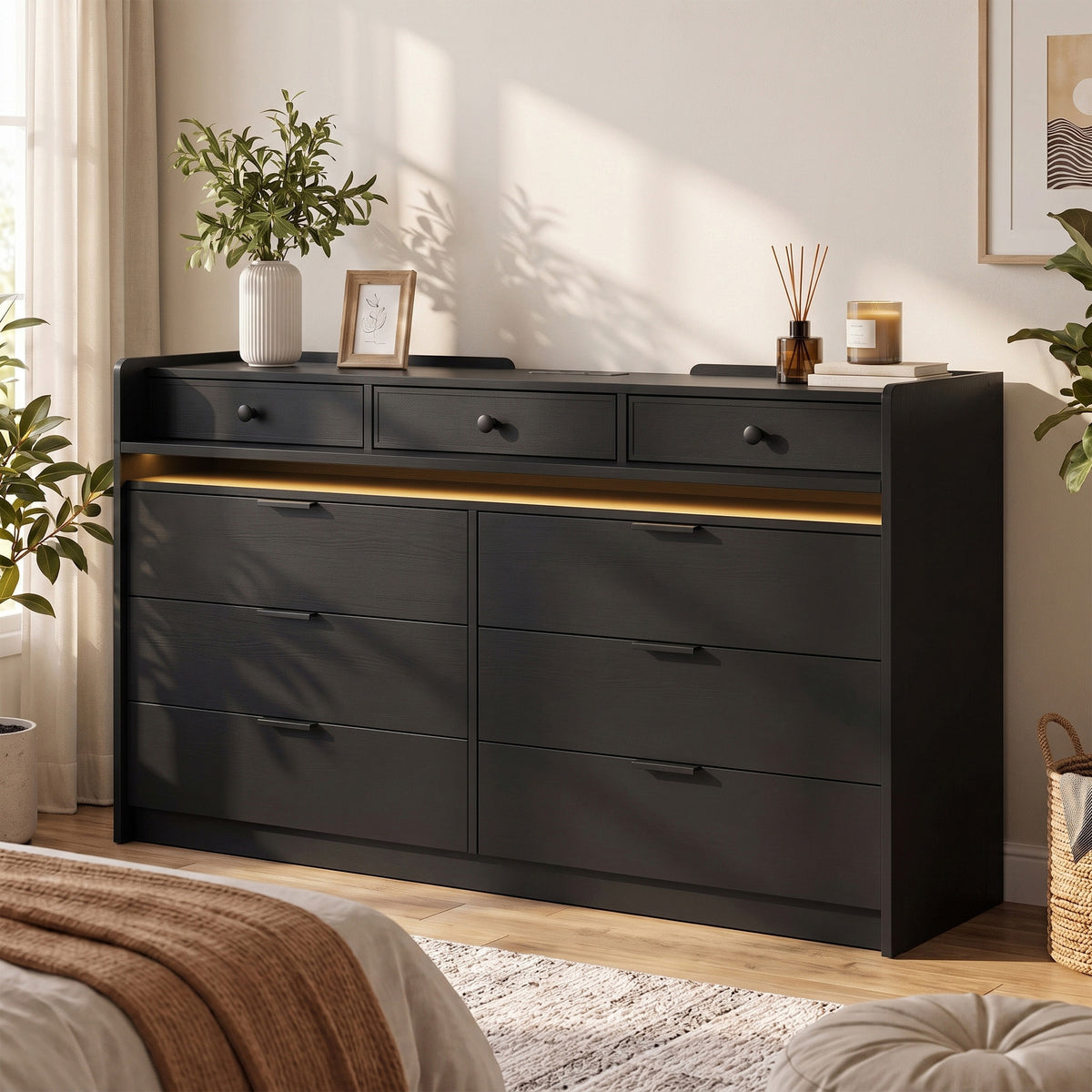 Black 9-drawer TV stand with warm LED strip and front drawer handles
