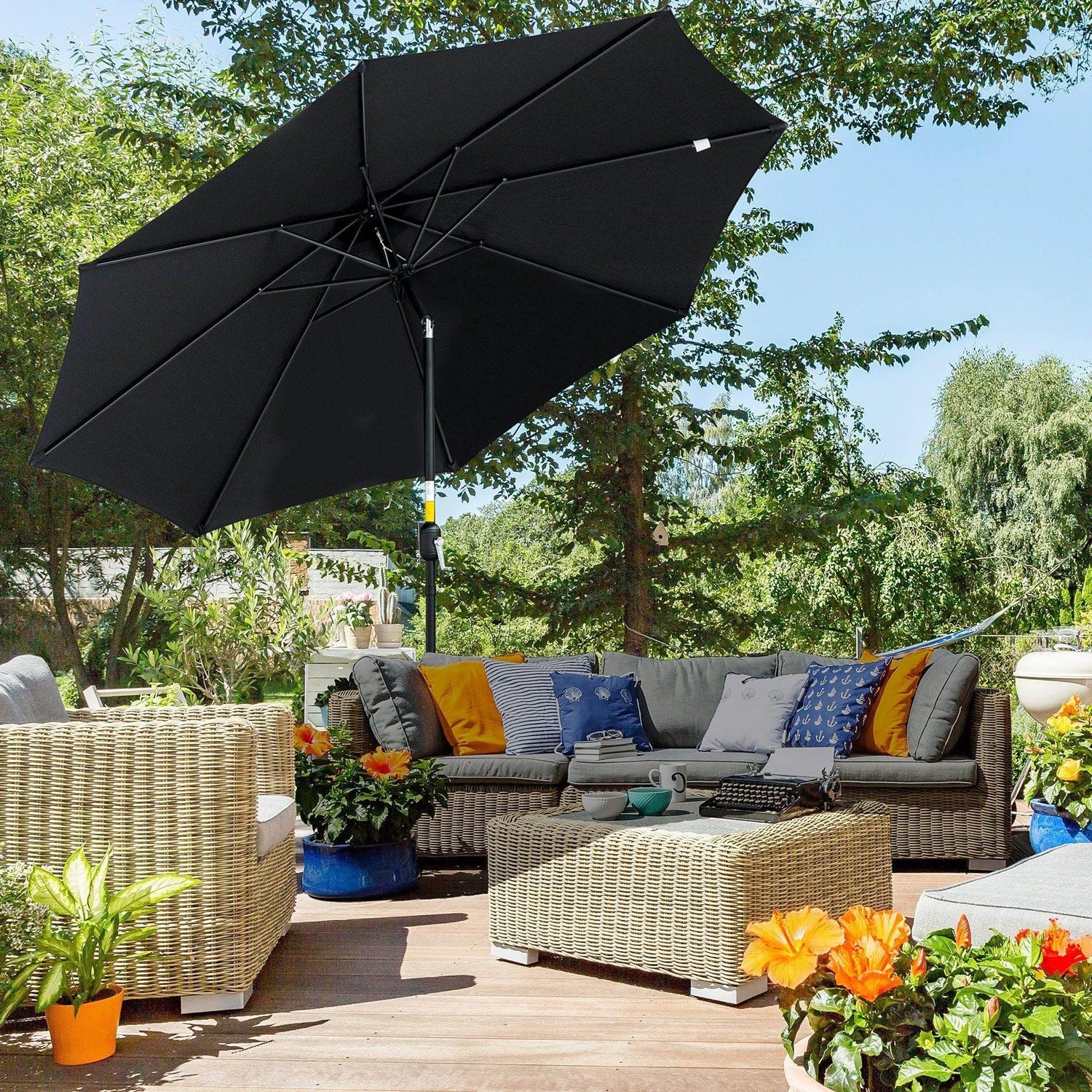 Black garden umbrella with 8 ribs and tilting canopy on a central pole