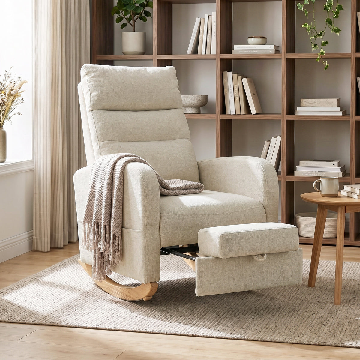 Light beige high-back rocking chair with padded footrest extended in angled view