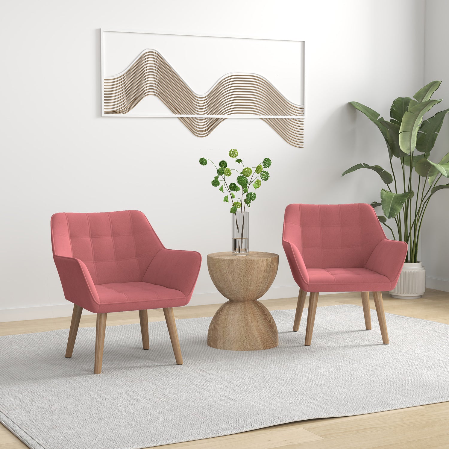 Set of 2 pink upholstered accent arm chairs with slanted backs and thick padded seats