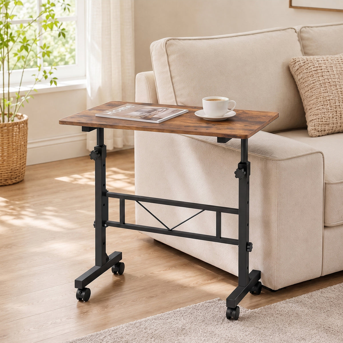 Height-adjustable overbed table with brown wood top and sturdy black caster legs