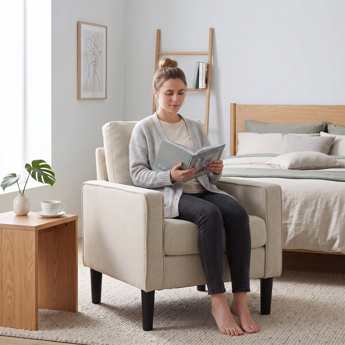 Cream accent chair with removable pillow and wide armrests for comfortable seating