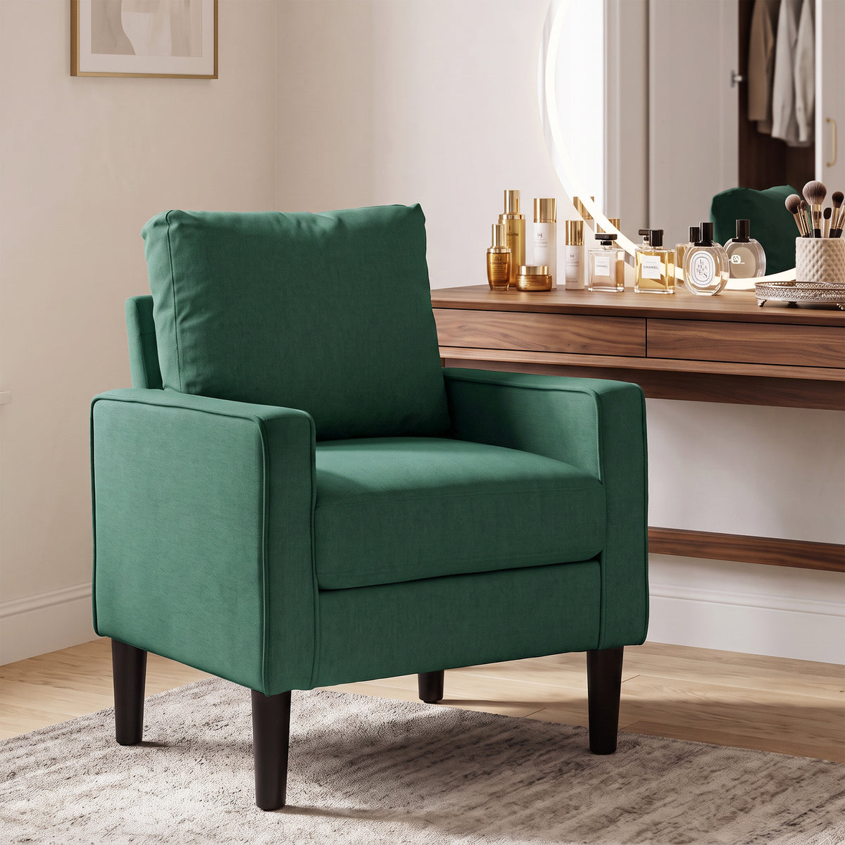 Dark green linen-look armchair with plush seat cushion and matching back pillow