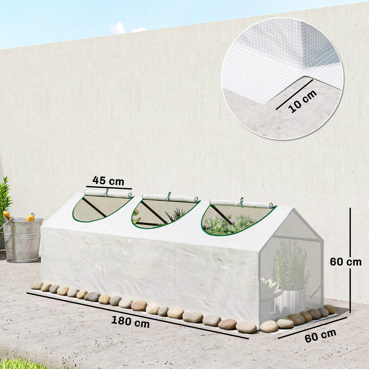 Portable mini greenhouse with white cover and green-trim zip windows along the side