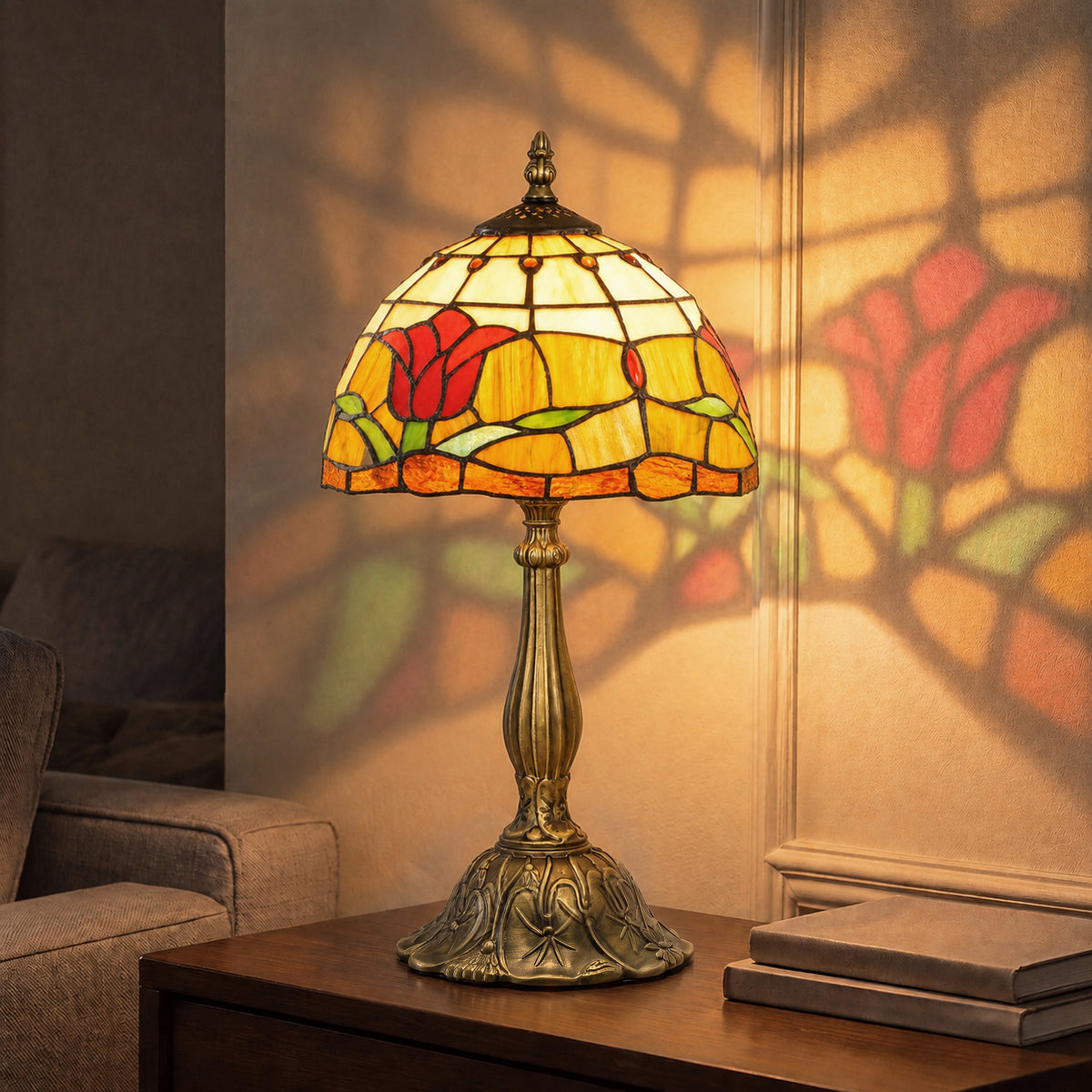 Tiffany stained glass table lamp with red yellow green shade and bronze base