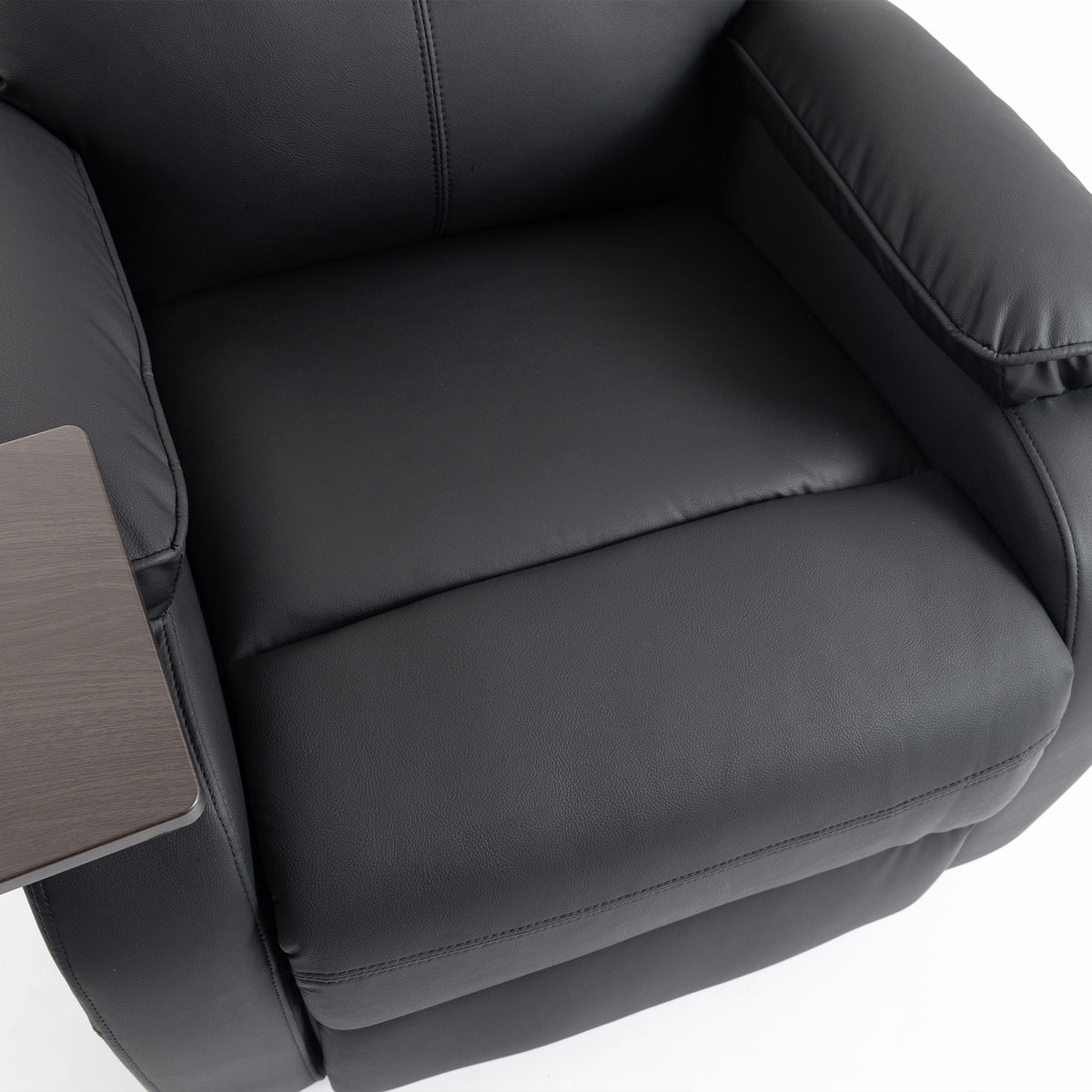 Close-up of electric lift recliner armchair cushion in dark smooth upholstery