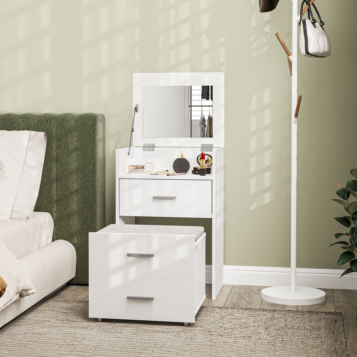 White vanity desk with flip-up mirror and two-drawer base, with storage stool.