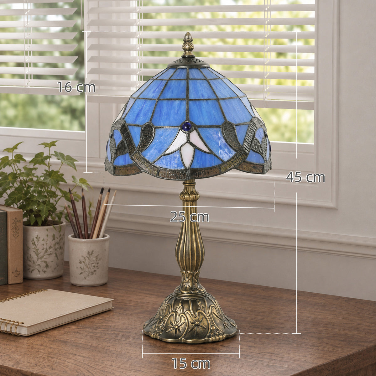 Blue and white stained glass table lamp with antique bronze base, size measurements shown