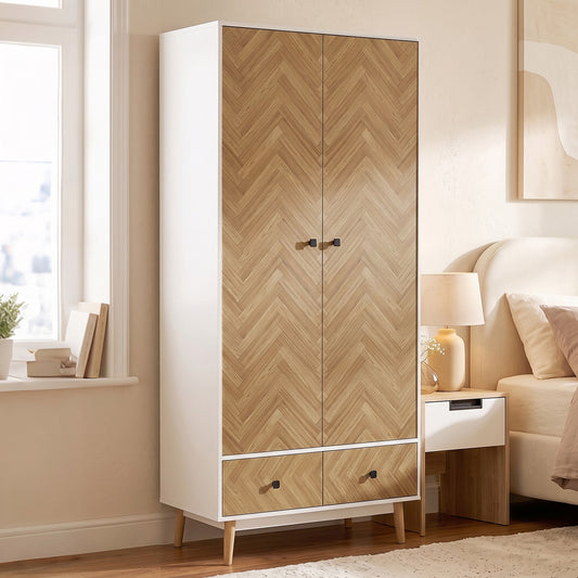 Wardrobe cabinet with two-panel doors, herringbone wood effect, and two bottom drawers