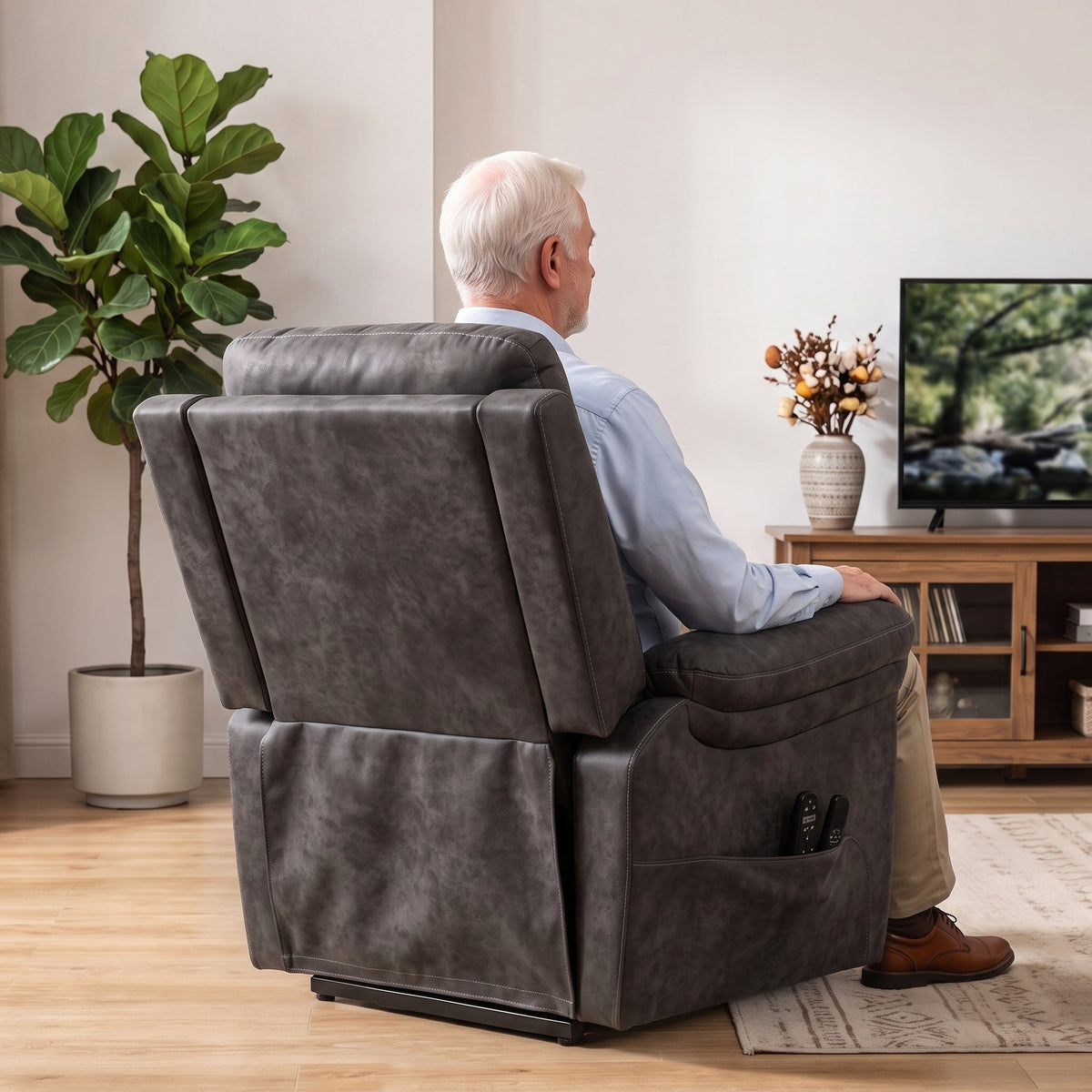 Grey electric lift recliner chair with tall backrest and padded head support