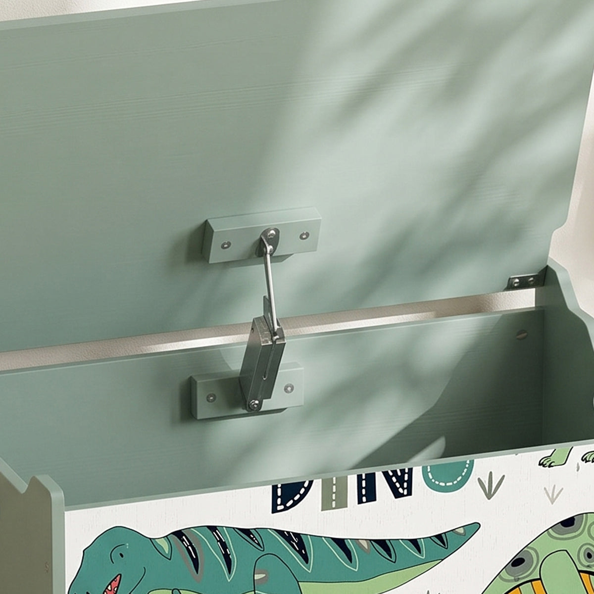 Inside view of green wooden storage chest lid with metal safety hinge hardware